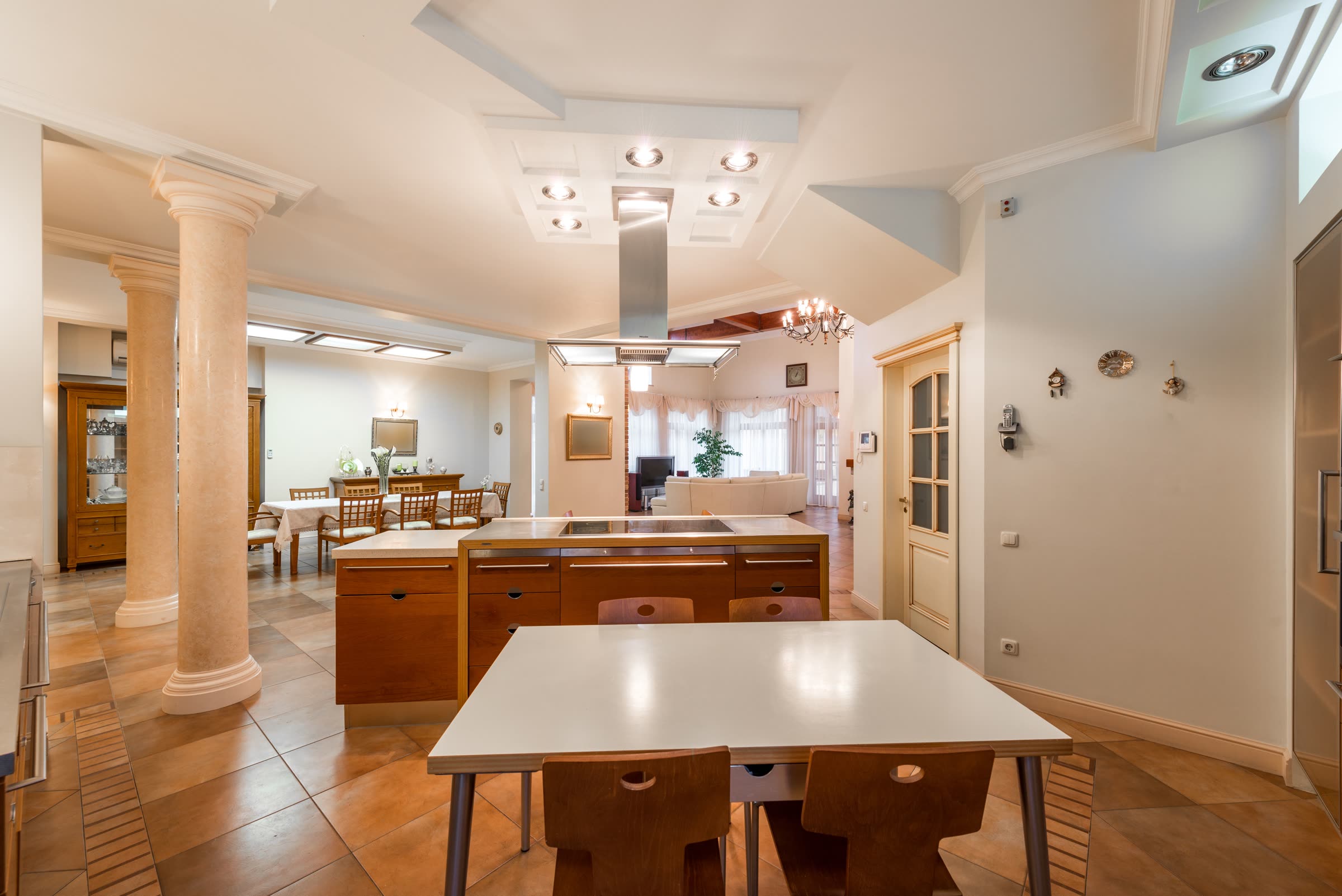 An open kitchen and dining space in a serviced home